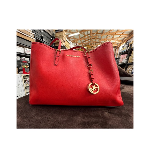 Michael Kors Handbags - Michael Kors Vibrant Red Tote with Gold Accents EUC